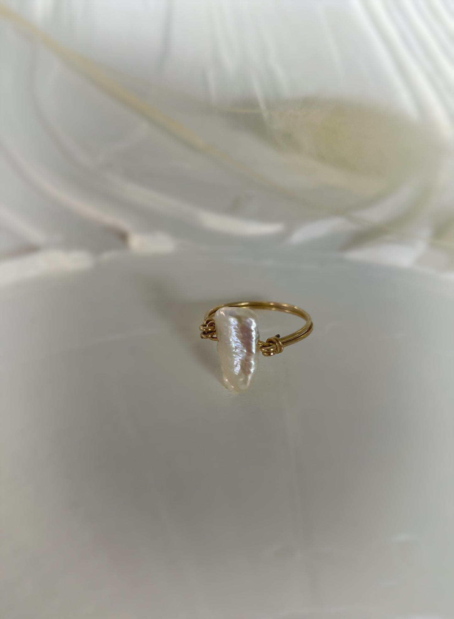 Long pearl ring